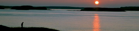 Photograph of a sunset over a lake